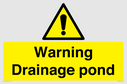 warning-drainage-pond~